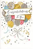 The image portrays an elegant congratulations card that seems to bottle the joy of a celebration, ready to be given alongside a bouquet from Flowers Harringay. The card's front is dominated by a cluster of illustrated balloons rising from the lower edge, grouped together like a carefully arranged balloon bouquet hovering above a sideboard in a Harringay home. The balloons are depicted in harmonious shades of metallic gold, brushed silver, soft champagne, powder blue, rosy pink, and gentle grey, each one softly shaded to suggest fullness and a subtle, pearly glow. Patterned details-tiny sparkling stars, fine stripes, and light speckles of glitter-decorate the surfaces of the balloons, offering visual texture and the suggestion of a tactile, shimmery finish. Thin ribbons in gold and silver extend from the base of the cluster, looping and curling downward with an easy grace that guides the eye and adds movement. Across the centre, a broad banner unfurls in a creamy hue, its edges just slightly darker to give a gentle three-dimensional effect, as if lifted slightly from the card. On it, the phrase "Congratulations To You" is written in flowing, calligraphic script, elegant yet approachable, like a handwritten message from someone truly proud of your success. Around the balloons and banner, delicate metallic stars, swirling curls, and dot-like confetti softly scatter across a light background, evoking the feeling of being in the middle of a quiet, refined party, perhaps after speeches and applause have faded. The card's finish looks smooth and high-quality, with select glitter accents that would catch the light when tilted. Overall, it is a warm, celebratory congratulations card, perfectly suited to accompany fresh flowers for graduations, promotions, new chapters, or any special achievement in Harringay.